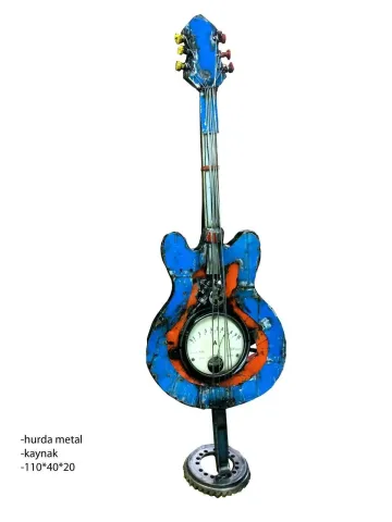 ASAF ERDEMLİ — “Gitar”, 2017 "Gitar" eseri ASAF ERDEMLİ tarafından 2017 yılında 110x20x40 cm ölçülerinde Hurda metal tekniği ile yapılmıştır.