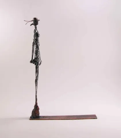"İsimsiz" eseri ÖZER AKTAŞ tarafından 2016 yılında 34x20x5 cm ölçülerinde Demir yontu tekniği ile yapılmıştır.