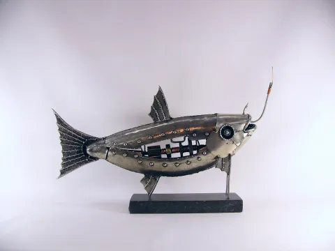 ÖZER AKTAŞ — “Balık”, 2025 "Balık" eseri ÖZER AKTAŞ tarafından 2025 yılında 30x55x10 cm ölçülerinde Demir yontu tekniği ile yapılmıştır.
