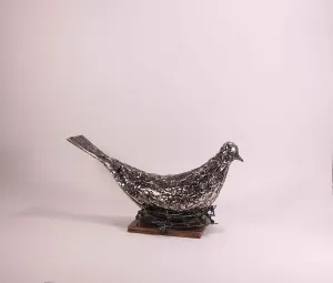 ÖZER AKTAŞ tarafından 2016 yılında 13x15x30 cm ölçülerinde Demir yontu tekniği ile yapılmıştır.