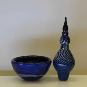 TAHA BAYDAR tarafından Serbest Sıcak Cam Şekillendirme tekniği ile yapılmıştır.